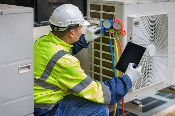 Professional Air Duct Cleaning technician working in West Townsend, MA